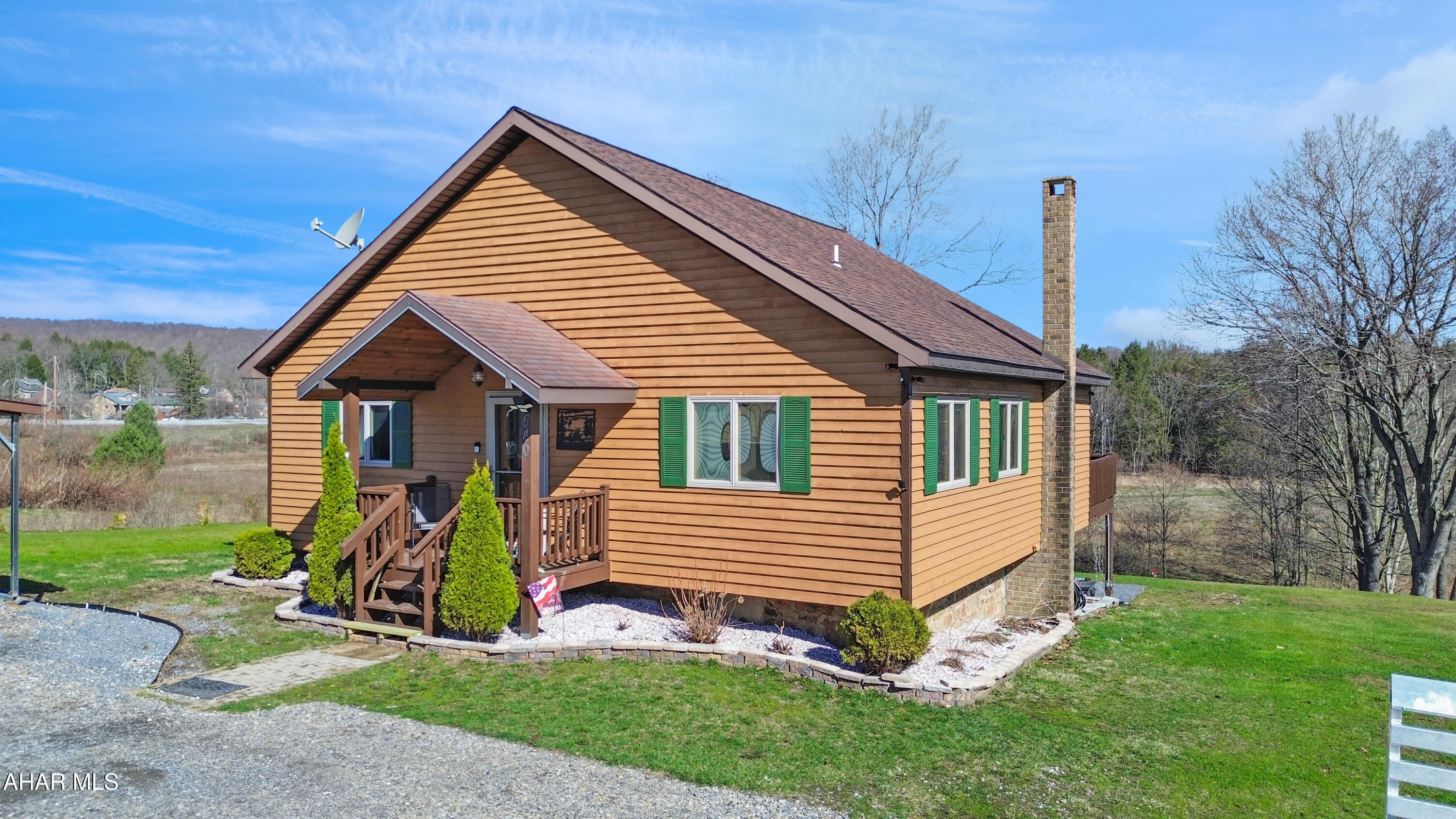 Welcome to 540 Pike Road in the Central Cambria School District - a beautiful wood-sided home offering the perfect blend of privacy and convenience. Step inside to find an open-concept main level highlighted by cathedral ceilings and an abundance of natural light. The entry level features a spacious eat-in kitchen with included appliances, a large living area with sliding glass doors leading to the rear deck, a fully updated bathroom, a generous bedroom, and a primary bedroom with direct access to the deck. The lower level includes an integral one-car garage, laundry and utility areas, and an additional bedroom or office space, offering flexibility for your needs. Outside, the property truly shines. Situated on approximately 0.6 acres, you'll enjoy a newly constructed 30x30 heated garage, a large rear deck, a firepit area, and beautifully maintained grounds. Don't miss your opportunity to own this well-maintained, move-in-ready home. Schedule your showing today!
