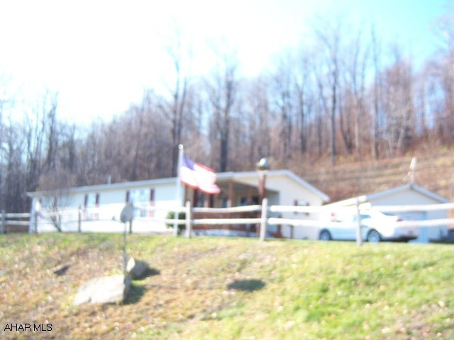 Absolutely beatiful setting! Spacious rooms throughout. Great country site. 5.5 acres