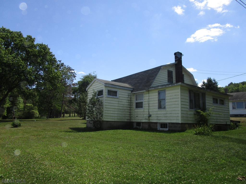 1.5 story vinyl sided dwelling on a 80 x 200 +/- lot.  This was the original homestead for the family and has been used as a summer home/camp for the past 30 years. Home could use some updating but the location is good and it appears mechanically sound.  5 minutes to Prince Gallitzin State Park.  Price to sell.