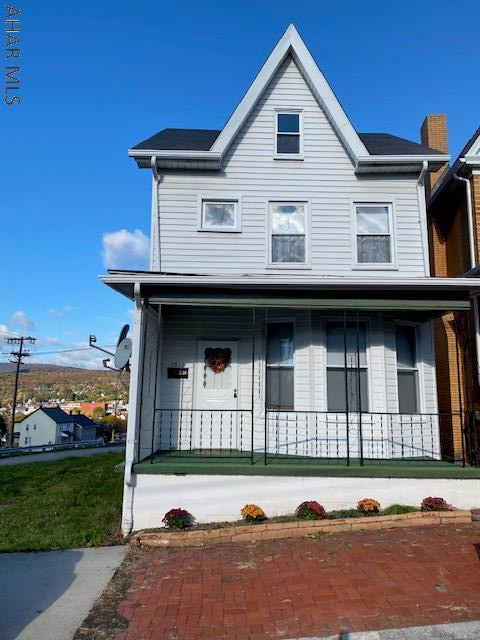 Very nice 3 bedroom home on a corner , fenced-in lot. This home offers a large eat-in kitchen with a beautiful view of the mountains. The walk up attic could easily be finished for extra storage or bedroom. Covered side porch and front porch.