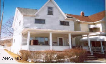 Includes stove, refrig, washer & dryer, freezer.  New roof 2001.  Corner fenced yard. Corner 3+BR, windows replaced.  New roof 2001.  Bonus room on 2nd floor.