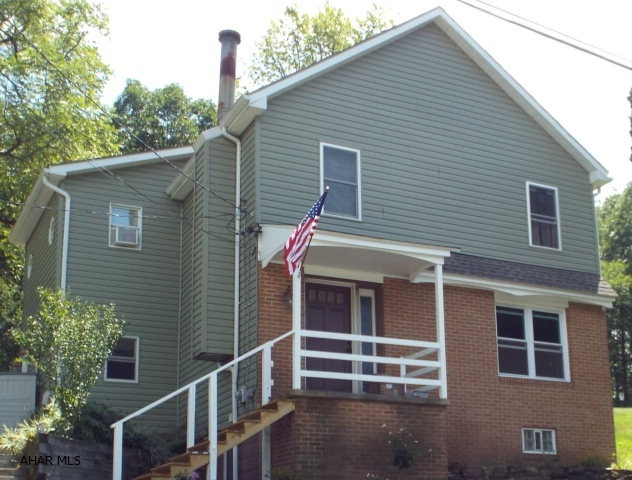 Charming 3 bedroom near Penn State Altoona Campus. This home is in move in condition.  Boasting a private setting with a large back yard.  Featuring an eat in kitchen and first floor laundry.  Another amenity on the first floor is a 3/4 bathroom.  There is a fire pit in the backyard for those outdoor gatherings.  When it gets too cold outside use the wood burning stove inside the home.  One of the sheds can be used as a workshop.  Don't miss your opportunity on a well maintained and super home.