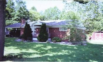 Brick Ranch brick ranch on .6 acre, small stream in back, Flood insurance required, shed & carport.