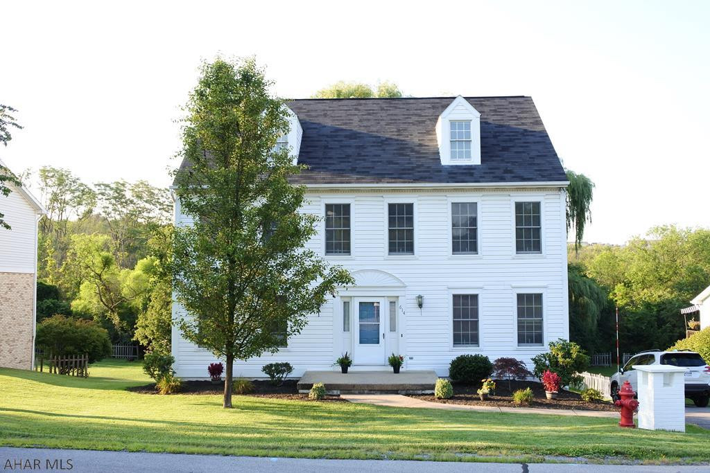 Hollidaysburg Schools!  Great location for this 2.5 story home.  4BR's, 2 full baths and 2 half baths.  1st floor features a big LR, FR, DR, kitchen, half bath plus a laundry.  Upstairs you'll find the Owners' Suite complete with a full bath and walk-in closet, 3 additional bedrooms and a full bath.  Lower level has been tiled and new sliding doors were just installed to the patio....add a half bath and this is the perfect spot for kids and their activities!  If that isn't enough space the 3rd floor could be finished for more room.  Close to shopping, schools and highways, but tucked away.