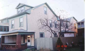 MUST SEE INSIDE! LARGE 4 BEDROOM WITH FINISHED ATTIC. GREAT WOODWORK, FIREPLACE & HARDWOOD FLOORS. NEW WINDOWS.   3 CAR BRICK GARAGE WITH HIGH DOORS INCLUDED. WOW! 4-5 BEDROOM HOME NEAR HIGH SCHOOL & VO-TECH. GREAT WOODWORK, FIREPLACE, NEW DECOR & WINDOWS. DOUBLE STAIRS. CALL DARLA 696-1227. GREAT 1ST TIME OR INVESTOR.   3 CAR BRICK GARAGE WITH HIGH DOORS INCLUDED.