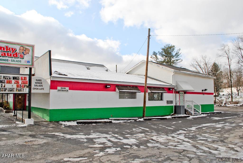 TURNKEY ENTERTAINMENT DESTINATION - OWN THE VENUE. OWN THE CROWD. OWN THE INCOME - An established, well-known bar and restaurant situated on 1.07 acres along a high-traffic roadway is now available for its next owner. After decades of successful operation, this iconic, turnkey business offers immediate cash-flow potential with significant upside for an entrepreneurial buyer. PRIME LOCATION & REAL ESTATE ADVANTAGE - 1.07 acres of commercial property, High daily traffic exposure, Large private parking lot, Strong community recognition. The location itself generates visibility and repeat traffic, providing a built-in marketing advantage. HOTEL LIQUOR LICENSE INCLUDED -A major asset of this offering is the included Hotel Liquor License, allowing for full bar and restaurant operations, live entertainment, promotional events, and expanded service flexibility. This license enhances operational freedom and competitive positioning in the marketplace. BUILT FOR REVENUE & ENTERTAINMENT - Designed to maximize guest engagement and spending, the venue includes:  Spacious dance floor, Elevated stage for live bands and DJs,• Private VIP area, Main bar and illuminated side bar, Dedicated pool room, Fully equipped commercial kitchen. Multiple entertainment zones create layered revenue streams under one roof, keeping guests onsite longer and increasing per-visit sales. TRUE TURNKEY OPERATION - This is not a startup or renovation project. The sale includes: Kitchen equipment, Bar equipment, Fixtures and operational infrastructure, Established brand recognition, Decades of loyal patronage. An owner-operator can step in and continue operations immediately. ADDITIONAL INCOME STREAM - Included with the property are five boarding rooms generating consistent monthly income. This diversified revenue component provides financial stability beyond nightly bar and restaurant sales, strengthening overall cash flow. GROWTH & EXPANSION POTENTIAL - For the visionary buyer, the upside includes: Expanded live music and themed events, VIP memberships and private rentals,  Catering and off-site services,  Outdoor event development on the 1.07 acres, Enhanced digital marketing and brand expansion. The infrastructure is in place -- the next phase of growth is yours to create. IDEAL FOR: Experienced bar and restaurant operators, Nightlife entrepreneur, Hospitality investors, Owner-operators seeking independence, Buyers looking for income plus lifestyle opportunity. This offering combines real estate, licensing value, established reputation, and multiple income streams into one compelling investment. Opportunities like this rarely come to market -- especially with property, liquor license, equipment, and income-producing rooms included. Private tours available by appointment. Financial information available to qualified buyers. Step into ownership of a proven entertainment destination and continue its legacy of success.