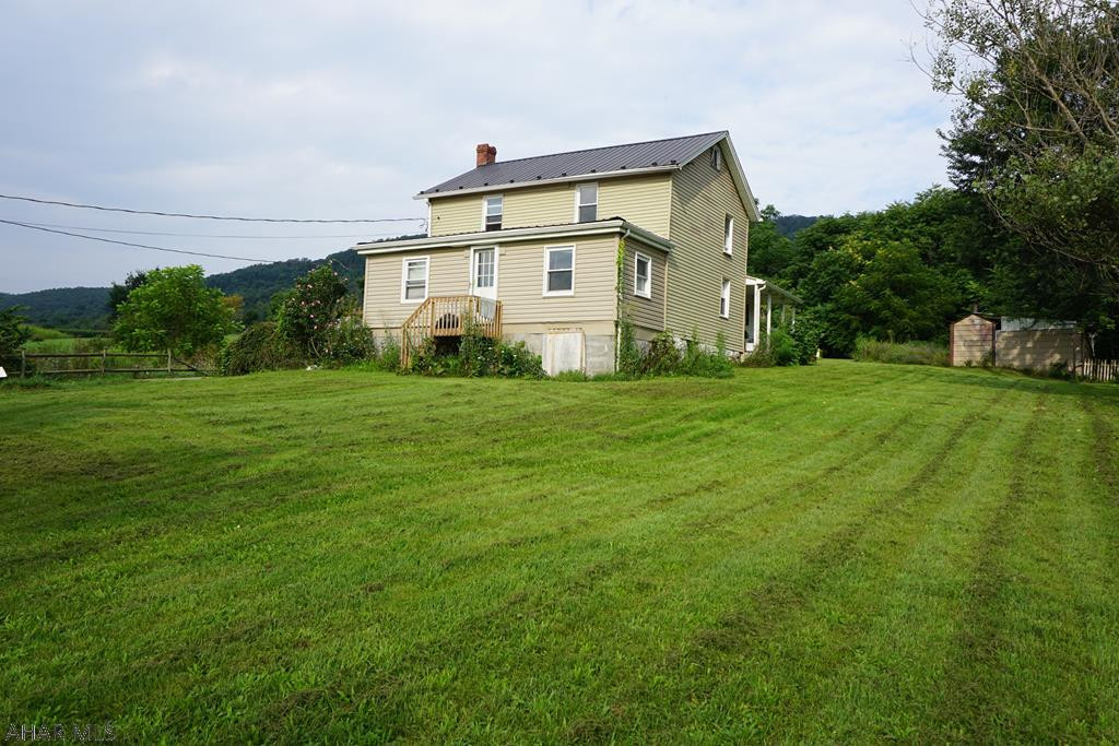 Motivated sellers! Large 3 bedroom, 1 bathroom home with first floor laundry, 1 bay detached garage on .51 acres located in Spring Cove district in a country setting.