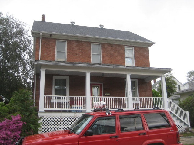 Older house that is in need of some finish work and repairs on second floor bedrooms. Bathroom has been remodeled. Main floor living space has been remodeled and is in good condition. Property has a nice size back yard. A two car detached garage sets on adjoing property with road frontage and could be made into possible storage unit.