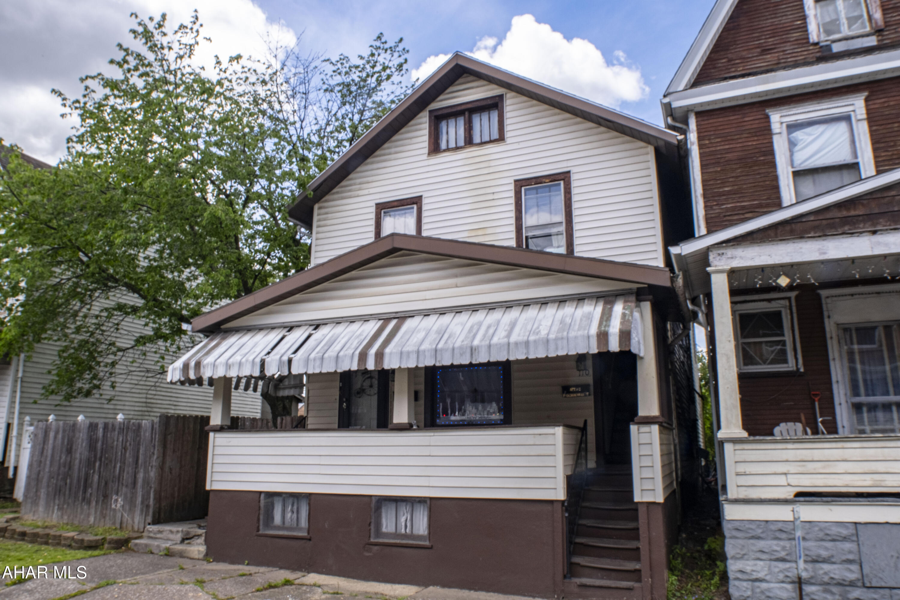 Solid income-producing duplex in Altoona with long-term potential. This well-maintained property at 110 5th Ave features two residential units and a detached garage, offering a strong rental history and consistent cash flow. The first-floor unit is a one-bedroom, one-bath apartment currently rented at $850/month, including garage access. The second-floor unit offers two bedrooms and one bath, rented at $600/month. Second floor tenants is on month-to-month lease.  First floor tenant is thru Oct 2026. The basement, accessible through a separate entrance, was previously used as a third unit and still includes a bathrooms offering potential for future reconfiguration or added storage. With a small yard, functional layout, and reliable rental income, this property is a practical addition to any portfolio.