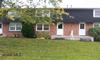 Don't rent it - Own it! Well maintained 2 BR townhouse with basement. Monthly Association Fee $140 - includes all outside maintenance, roof, trash, swimming pool, grass cutting, snow plowing. Seller is selling living room furniture and bed in bedroom.