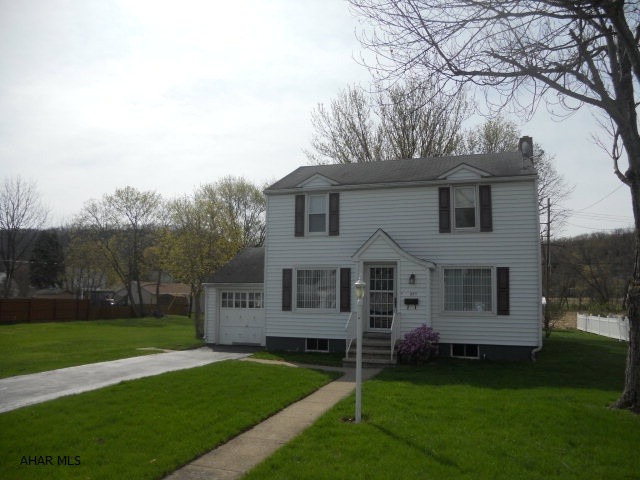 This home offers a perfect location right in the heart of Hollidaysburg!  Not only will you find yourself in a nice, quiet neighborhood, but this ‘move-in' ready house is conveniently located near downtown Hollidaysburg and Canal Basin Park.  Sitting on a flat, double lot, this home has a large yard with a spacious back deck that is covered for you to enjoy in rain or shine.   The beautiful hardwood floors span the first floor and the rooms have plenty of windows for natural light.  There are 3 bedrooms, 2 full baths and a gas fireplace.  The icing on the cake is the new high efficiency gas furnace in the home which will create big savings on heating bills.
