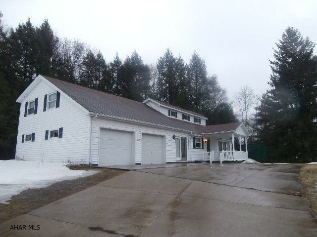 Nice 1.5 story home on a 2 acre lot. Two car garage with breezeway.