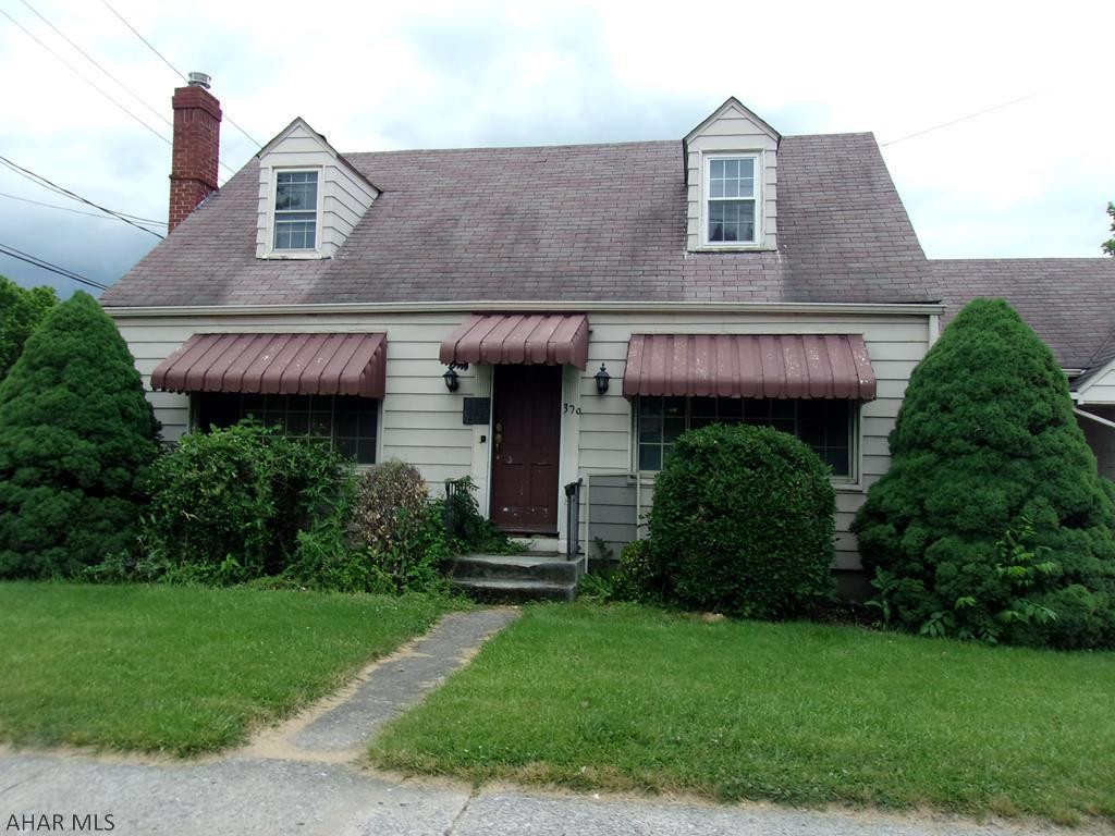 Come look at this charming cape cod w/ original hardwood floors & oak trim throughout. Possible first floor main bedroom w/ full bath. 2 bdrms & full bath upstairs. New furnace. Cute kitchen w/ adjoining pantry. Inviting side porch. Breezeway & 1 car garage with storage above.