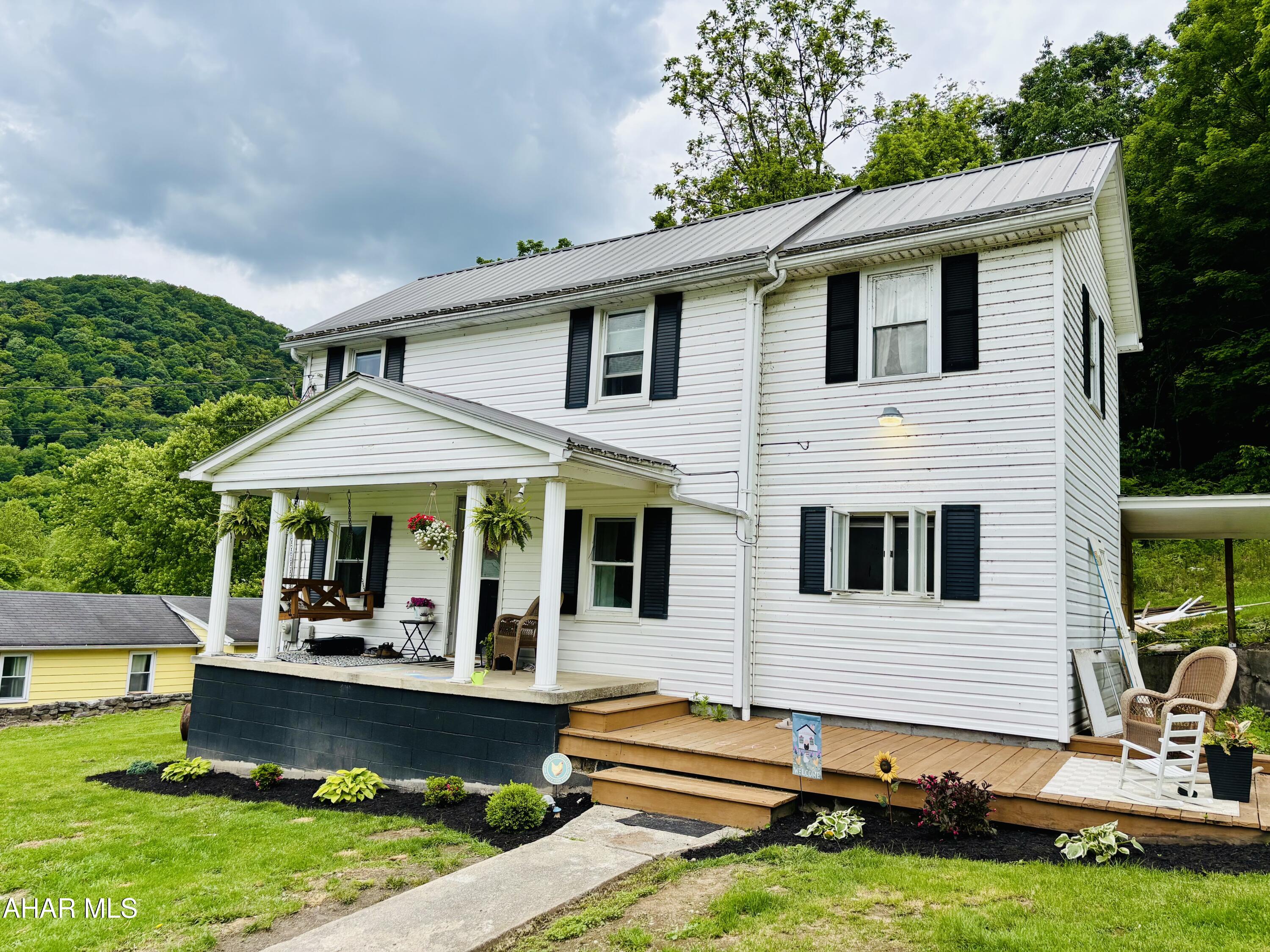 This 2-bedroom, 1.5-bath home sits on 1.71 acres with plenty of space to enjoy the outdoors. It also has two bonus rooms that could be used as an office, playroom, or extra storage. Inside, there are updated floors, trim, and paneling, along with a nicely redone bathroom featuring tile and a tongue-and-groove ceiling. This home also features a new laundry area, fresh carpet, and a newer furnace. Call today to check it out.