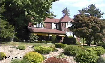 Stately brick home in move-in condition.  All appliances.  Open staircase.
