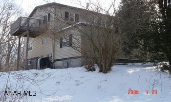 Walking distance to Rails to Trails and Juniata River. House has 2nd Floor apartment. 2 Car garage has 2nd Flr. Needs work. May have freeze damage. Sold "AS IS WHERE IS". Seller requires prequal letter with offer. Call agent regarding free appraisal and credit report offer.