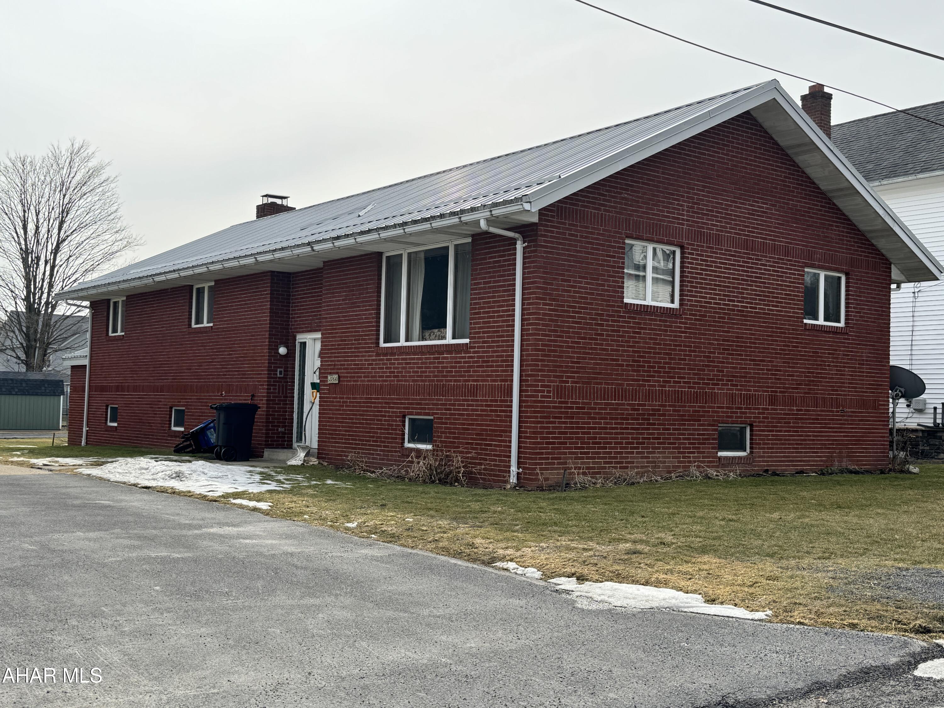 Brick split entry home featuring 3 bedrooms, full bath, living room and eat in kitchen.  Basement 3/4 bath and brick fireplace. Great home in a nice neighborhood location.