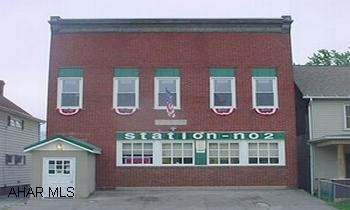2 story building - was former fire house.  1st floor is commercial space, 2nd floor was living quarters for firemen.  Would make a nice loft apartment.  Newer electric and furnace for 1st floor.  Security system. 2 story building - was former fire house.  1st floor is commercial space, 2nd floor was living quarters for firemen.  Would make a nice loft apartment.  Newer electric and furnace for 1st floor.  Security system.