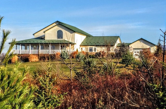 This secluded gem offers 115+ acres of a great habitat mixture of timber, thick brush, tillable acreage and water! Wildlife is plentiful, minutes to highways heading N-E-S-W. D.C. approx. 1.5 hours. Custom built open concept 2-story offers 5,200 sqft w/ 3-4 bedrooms and 4 baths. Enjoy all the views from the wrap porch. 70' x 40' barn w/ water, electric, 4 ponds, 2 streams and 7 fenced areas.