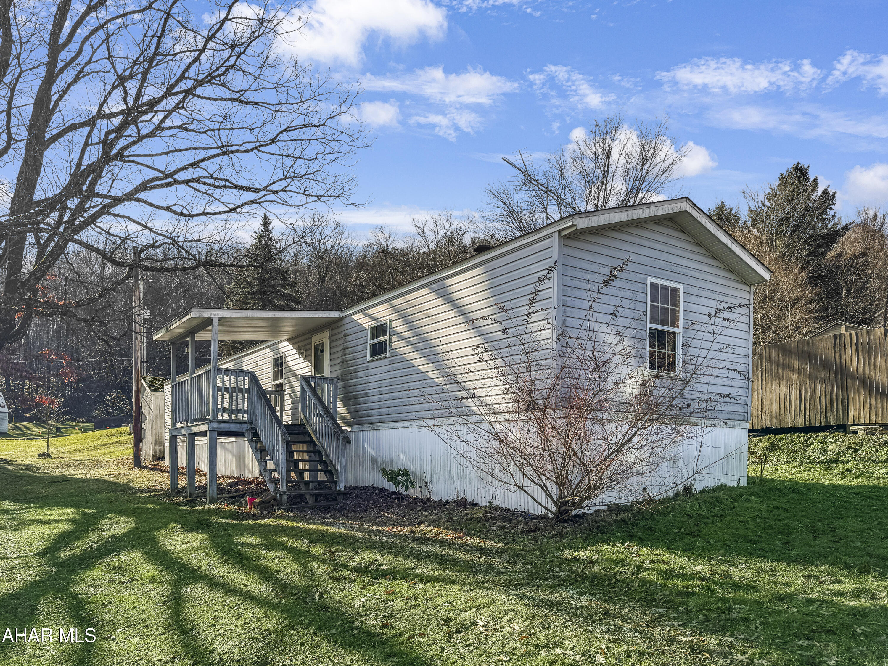 Welcome to 1715 Mott Street, a charming manufactured home nestled on a peaceful dead-end street within the Blacklick Valley School District. This inviting residence boasts three comfortable bedrooms & one & a half bathrooms. You'll love the expansive living area, as well as the generously sized kitchen, which offers ample cabinetry for all your culinary needs. The convenient laundry area adds to the home's functionality. Step outside to discover a delightful covered porch, an ideal spot for enjoying your morning coffee or evening relaxation. The spacious yard provides plenty of room for outdoor activities, while the shed offers additional storage options. Enjoy the convenience of off-street parking as well. Call today for more information on this wonderful home!