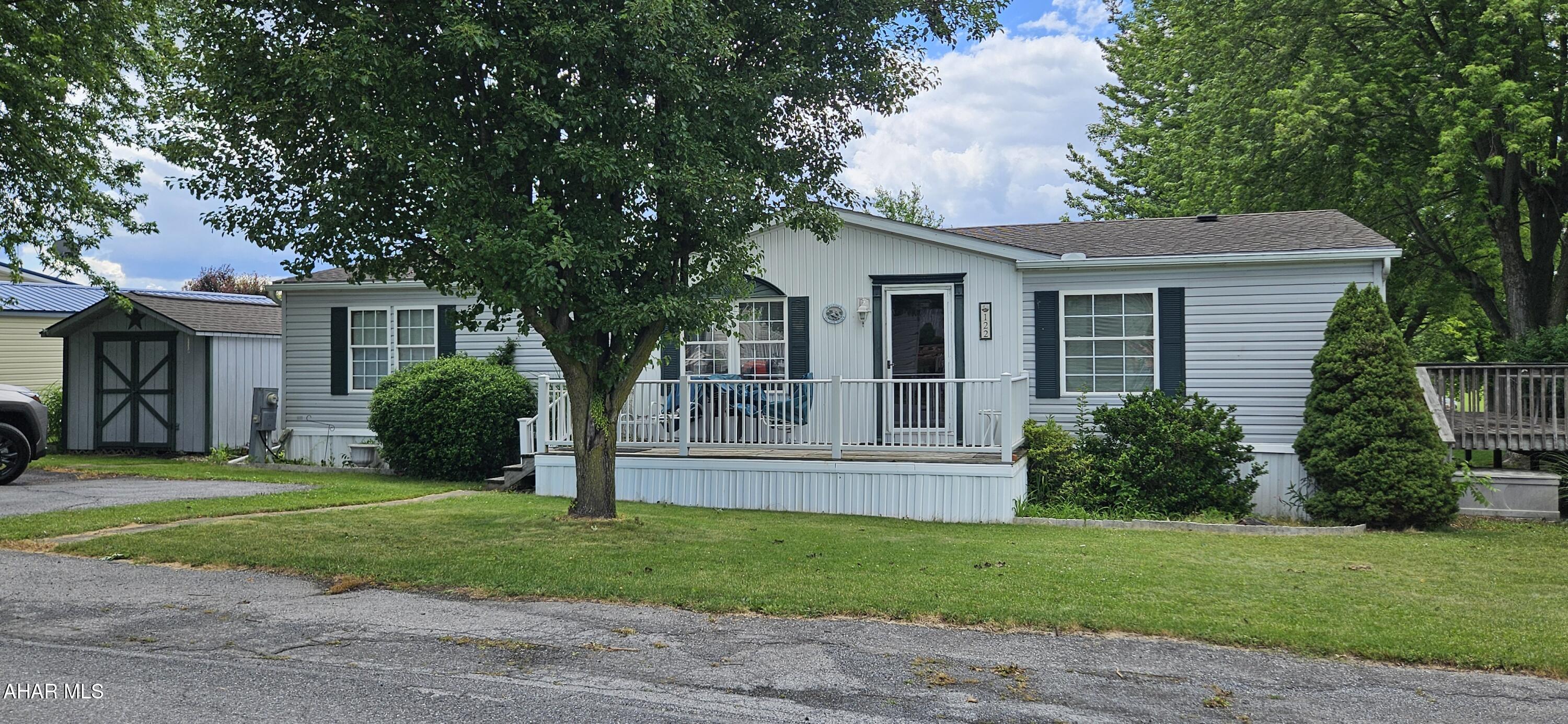 WELL-KEPT, SPACIOUS MOBILE HOME IN LOVELY COMMUNITY.  CENTRAL AIR.  2 DECKS. LARGE SHED INCLUDED.