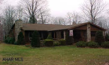 Immaculate cedar ranch on 2.5 wooded acres in smith development open floor plan- skylights, 2 fireplaces plus 2 car garage with 1/2 bath and enclosed patio WON'T LAST!!!!