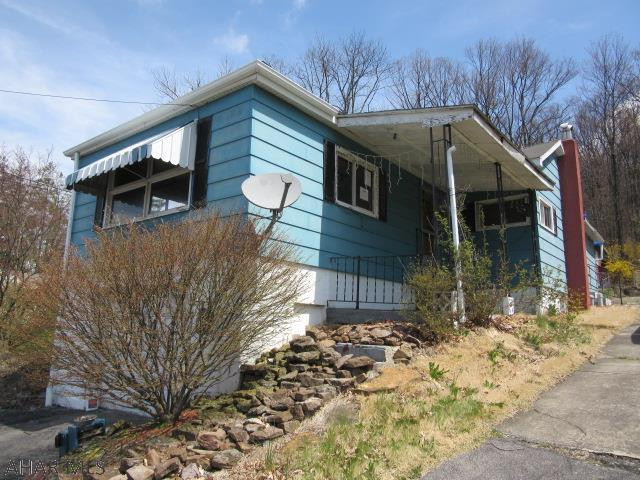 Great Location! Convenient to everything! One story raised ranch on a large lot with integral garage, 3 bedrooms, full bath, huge living room, some tlc will make this a great home, worth a look