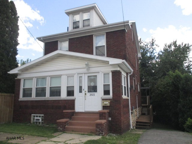 This spacious brick home offers a driveway, back deck, fenced-in double lot, new paint, French doors, a formal dining room w/ beautiful built-in cabinets and hutch, functional kitchen, large master bedroom and great walk-up attic that could be used for so many things! The seller is motivated to sell, so please, bring offers!