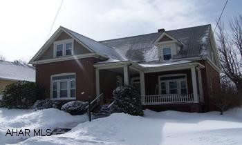 2 story brick  3 bedrooms, 1.75 baths; deck + screened in porch Fenced in yard, lovoely wookwork, open stair case pocket doors