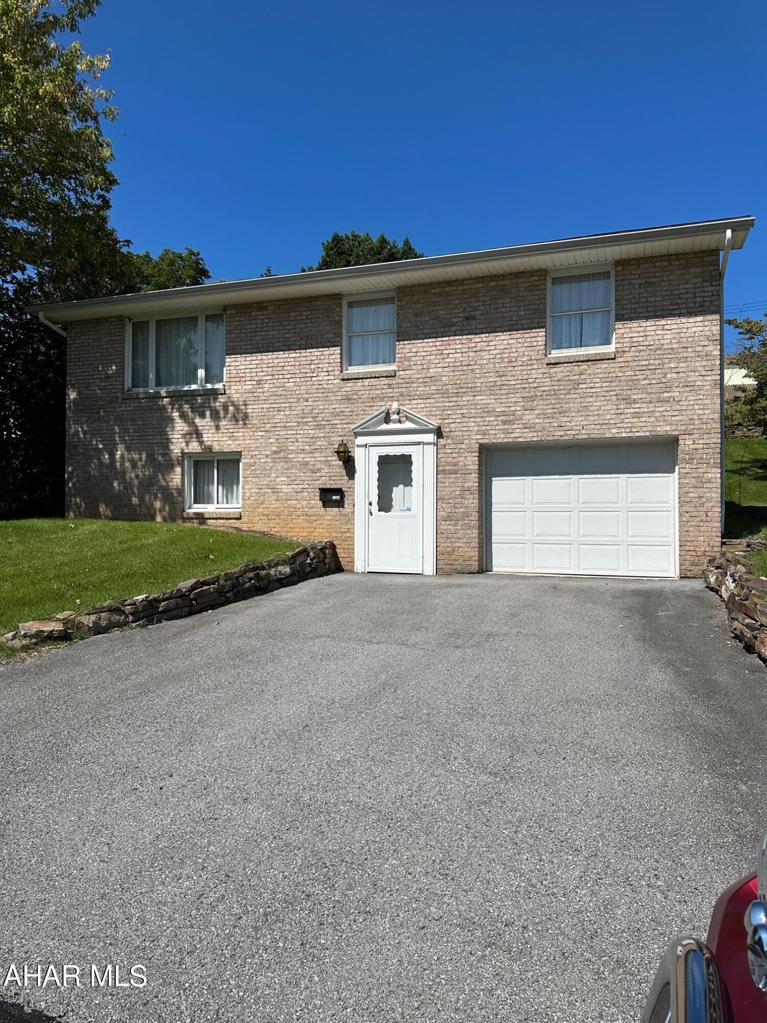 Nice raised ranch style home in great location.  Newer furnace and hot water tank.   Central Air. 
 Screened porch.   One car integral garage.
