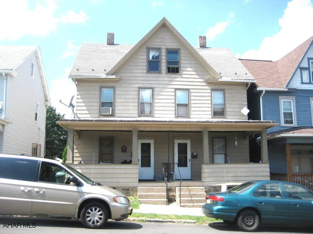 Great investment property in nice area, Long term tenants. Section 8 approved. Each unit has separate utilities, 3 bedrooms, dining room, living room, kitchen, & full bath. Two car garage can be used for extra income.
