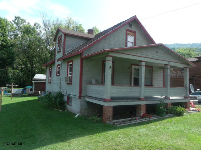 Nice investment property. Some TLC would make this a really nice residence.  4 bedroom, one bath cape-type home.  Last tenant paid $550 and all utilities except sewer.  The sale of this property also includes a small vacant lot behind the house measuring 22 X 118 IRR; tax ID Map 9-7B, parcel 49 which has an appraised value of $110 and annual taxes of $16.94.  Home and lot being sold AS IS to settle estate.