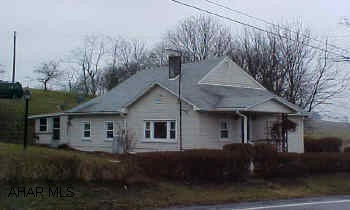 Well maintained one story home in country setting. Home features updated vinyl siding, shingle roof, thermo pane windows, and furnace. Kitchen, living room, three bedrooms and one bath. Ready to move into.