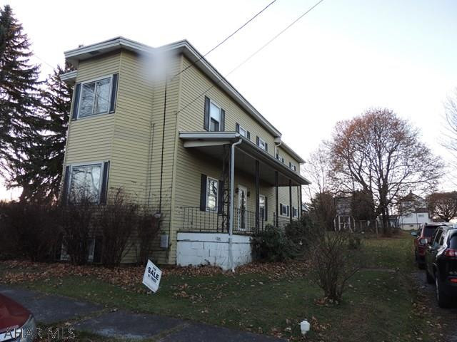 Must see this uniquely built home with lots of potential. This home offers 2 family areas on the first floor, 4 large bedrooms, 2 and 1/2 baths, 2 sets of stairs for easy access to the 2nd floor.  all on a .34 acre level lot.  Some TLC will make this a great home.