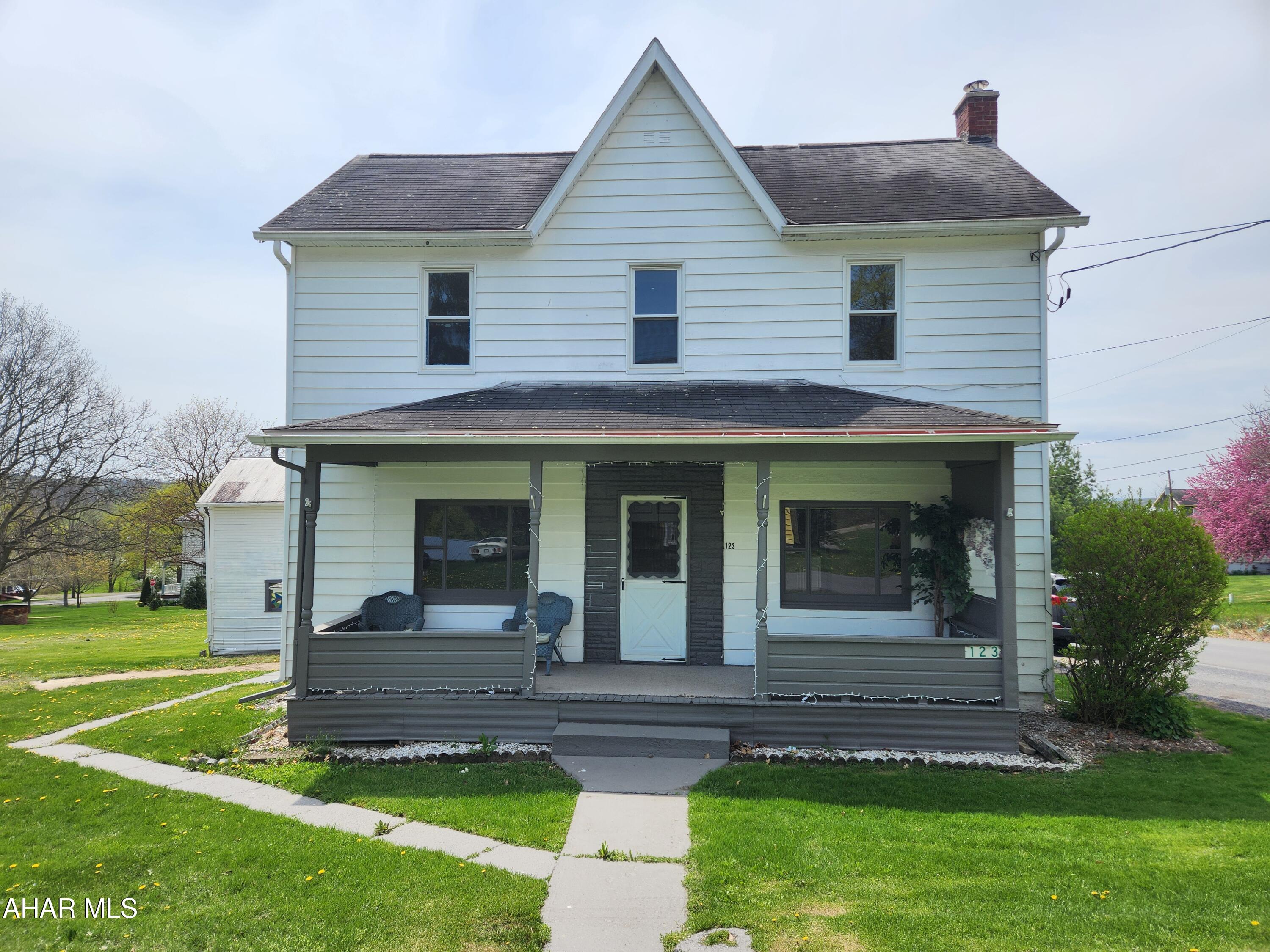 Come take a look at this hard to find four bedroom home in the Chestnut Ridge School District.  This sturdily built home is ready for a new owner to give it some TLC and make it their own.  With over 2000 square feet of living space, a gently sloping double lot with a 1/3 of an acre, a detached two-car garage, a storage building, a summer kitchen and a smoke house, this may be just the place you are looking for.  This home would be a great place to raise a family or used as a rental property.  What are you waiting for?  Schedule your showing today!  Buyer to verify acreage and square footage.  Both were taken from the property tax record. Property is being sold 'As-Is'.