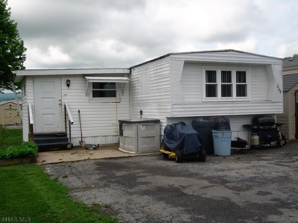 2 bedroom 1982 Champion home with new shed, modern kitchen and lg. living room. New hot water tank, new plumbing, new windows.