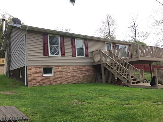Well maintained 3 bedroom raised ranch located in Portage School district. Beautifully updated full bath, new coal stove, new hot water heater, if you like outdoor living the is the one for you. Stocked trout stream in front of the house and close to all 4 wheeler trails. Entertain family and friends in the back yard with new retaining wall area and spacious deck.