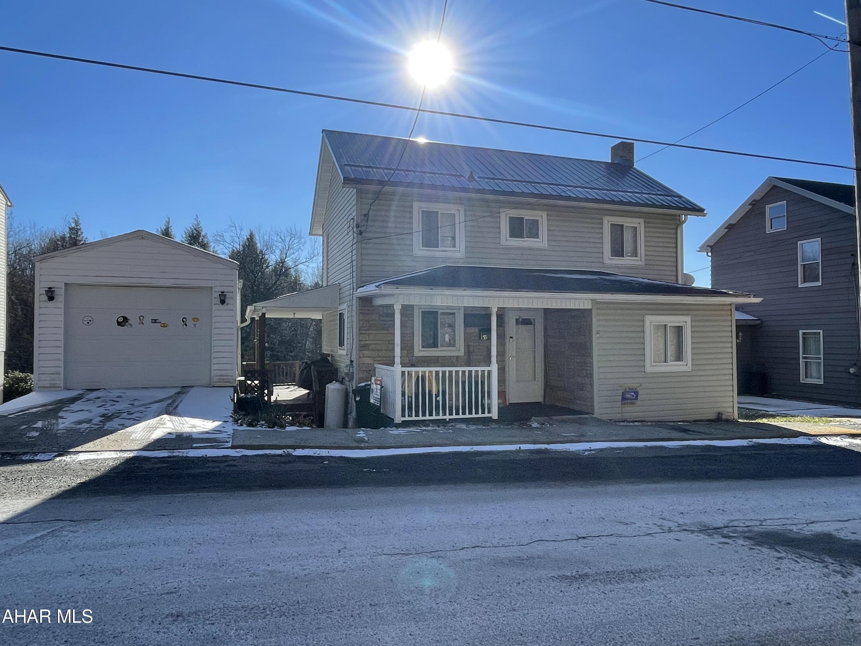This home has many updates inside and out which makes it the perfect starter home.  Completely renovated eat in kitchen has plenty of countertops for meal prep and cabinets for storage, it includes appliances.  First floor mudroom/laundry room. Spacious living room with small bonus space that is currently used for toy storage, but would make a nice office.  Upstairs you have two spacious bedrooms and the 3/4 bath.  Enjoy grilling in the summer under the covered deck.  Large yard and a one car garage.  New roof and Central AC recently installed.  Brand new hot water heater just installed.