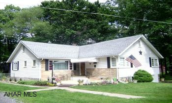 1 STORY RANCH HOME, 3 BR'S, 1 BATH, LARGE SPACIOUS 1/2 ACRE LOT. FENCED YARD. CENTRAL AIR. HARDWOOD FLOORS, TILE FLOOR. APPLIANCES INCLUDED. BEAUTIFUL EAST BELLWOOD RANCH HOME WITH AN ABUNDANCE OF LIVING SPACE!  DESIRABLE BELLWOOD SCHOOL DISTRICT. COVERED DECK LEADS TO FENCED YARD. ENJOY TIME IN THE EXCEPTIONALLY LARGE LIVING ROOM.  CONVENIENT 1ST FLOOR LAUNDRY.  AMPLE CLOSET AND STORAGE SPACE.   NEWER WOOD/COAL STOVE, CENTRAL AIR. NEWER SHED, ALL ON 1/2 ACRE.  CALL LISTING AGENT WALLY ROSSI 935-9259.