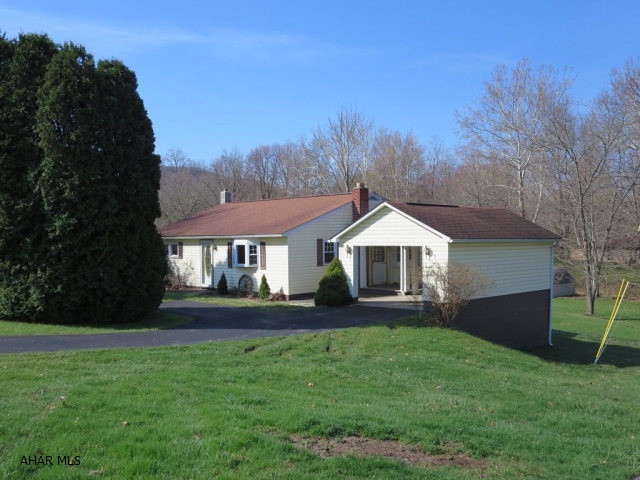 Nicely maintained, ready to move-in, three bedroom rancher. Interior has been repainted. Conveniently located only minutes from Shawnee State Park and State Game Lands. 10 minute drive to Downtown Bedford.
