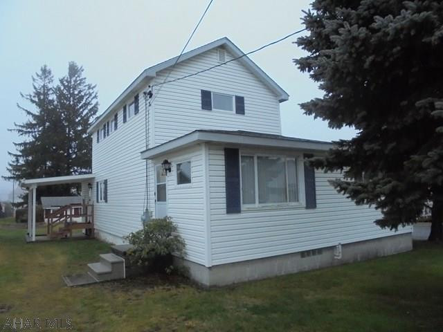 2 story vinyl sided home with a 1 story addition, featuring 1st floor master BR with 3/4 bath. 1st floor laundry. Large L shaped living room. 1 car detached garage. A must see!