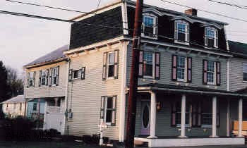 2 1/2 story vinyl siding w/ shutters.  Large back yard. Bedford Historic Distric.