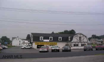 PRIME LOCATION IN PLEASANT VALLEY. CORNER OF 7TH ST. & PLEASANT VALLEY. 3900 SQ. FT. BUILDING. WELL MAINTAINED. NOW BEING USED AS A CAR LOT. ZONED COMMERCIAL. MANY OPTIONS. CONTACT SUSAN 935-8252.