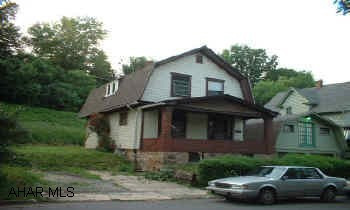 Zoned commercial/residential. House plus extra lot. Lots of character inside - needs some TLC but could be so charming!  AGENTS:  COMMISSION SPLIT IS AFTER 25% REFERRAL FEE OF TOTAL COMMISSION.  CALL LISTING AGENT FOR MORE INFORMATION.