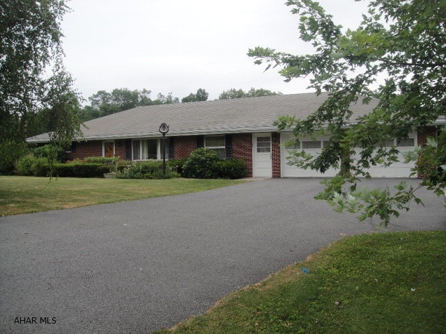 Nice brick ranch home on 0.689 ac. Kitchen, dining room, living room, 3 bedrooms and full bath on first floor. Swirled ceilings. Large 27'x 29' attached 2 car garage with inside stairway to basement. Basement is finished with kitchen, living room, 2 bedrooms, full bath and large workshop/office. Basement could be used as a separate living space. Hot water oil heat, central air, walk up attic for storage. Black topped driveway. Separate outdoor storage shed. Don't miss out on this one!