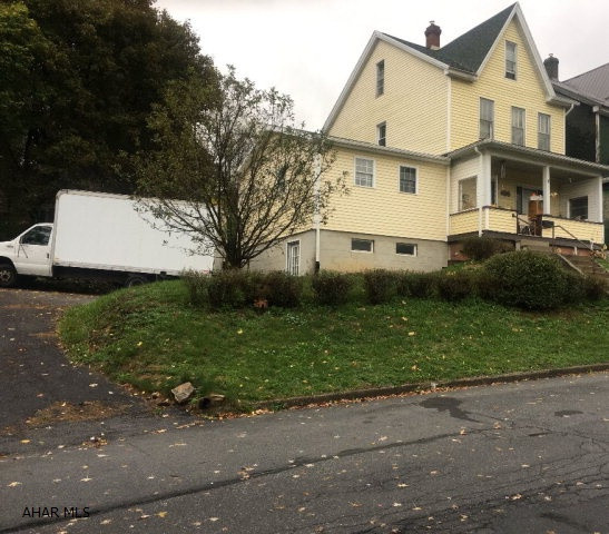 One floor living in a 2 1/2 story home!  This home fts a 1st floor master suite and laundry room!  Lrg LR, EIK and all season room also on 1st floor. Attic could be finished for another BR, living space or office.  BSMT could be converted into a 2 car garage.