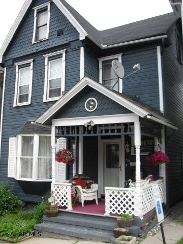 Great Buy for the Money!  Efficient, Charming and updated 3 bed 1.5 bath has new oak kitchen with built in table and 1st fl. laundry area.  Gas log fireplace. Ceramic tile in kitchen and dining area.  Heating, central air, roof and plumbing have been replaced or updated. Currently working on other repairs including updating electric service to make move in ready! Lovely fenced garden area off large deck. Off street parking. Close to campus or park your car and walk to hospital!  Owner will consider up to 6% seller assist at full price.