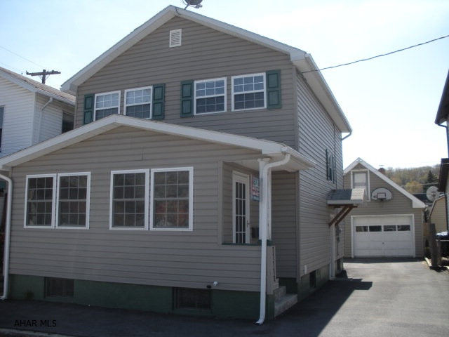 Great 3 bedroom, 1.5 bath home! Vinyl sided, newer windows & furnace, open floor plan, partially finished basement, off-street parking & detached garage with heat & storage. Move-in ready!