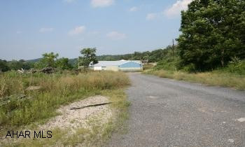 Saw mill/Storage building on 28.5 acres. Saw Mill / Storage Building 32'x89' + 53'x55' + 14'x30'  Tool / Storage building 16/x32'Garage 12'x21'Lumber storage / Grader 14'x72'