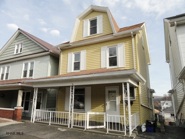 2 1/2 story in nice Altoona neighborhood. 4 bedrooms, 1 full and 2 half baths, large eat-in kitchen w/all appliances. Lovely foyer and hardwood on 2nd floor. Large deck leads to fenced yard and 2 car detached garage. This is a wonderful starter family home. Newer roof and  many new insulated windows. Add your personal touches and move right in.